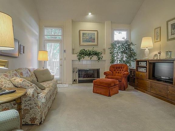 Living room features a fireplace