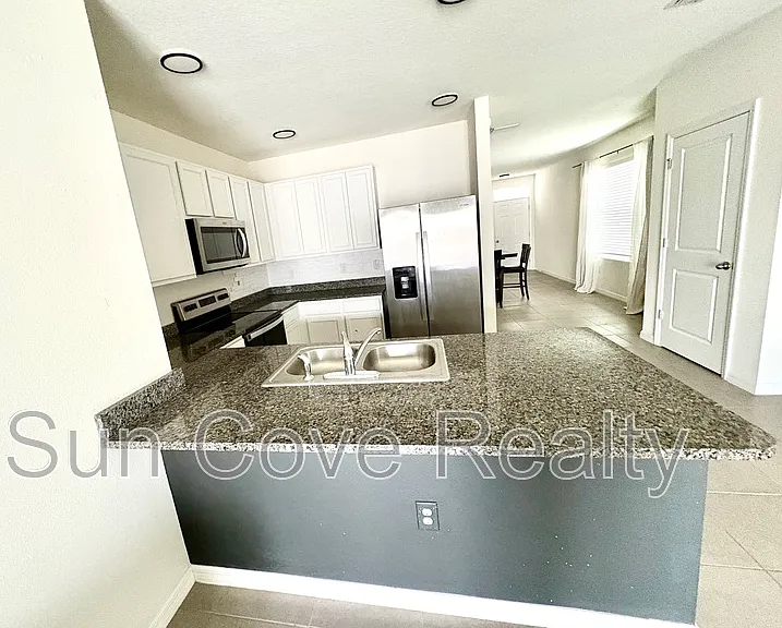 3180 Suncoast Plains Dr — Photo 9