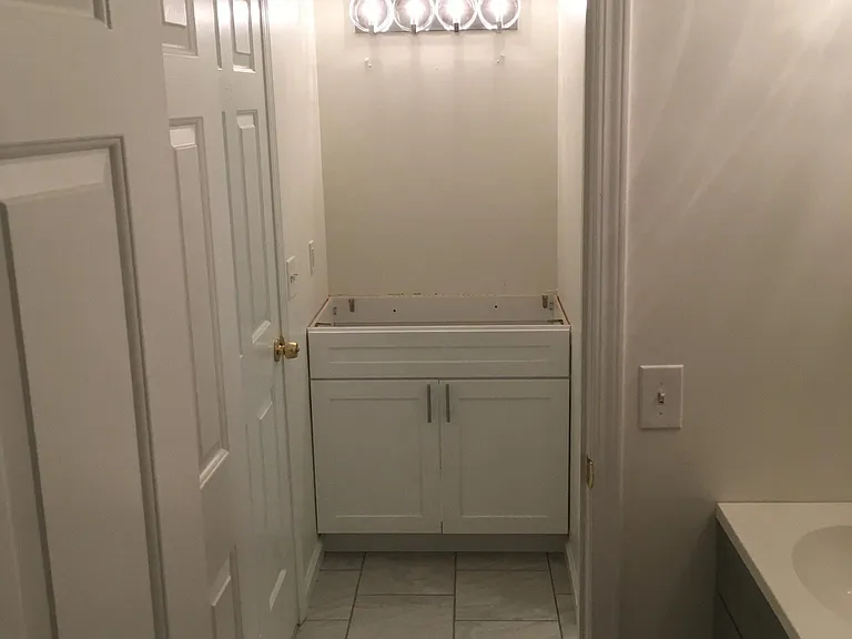 View from powder room to master bath.