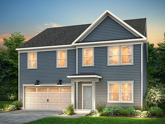 Hampton Exterior CR101 features siding, covered front door and 2 car garage