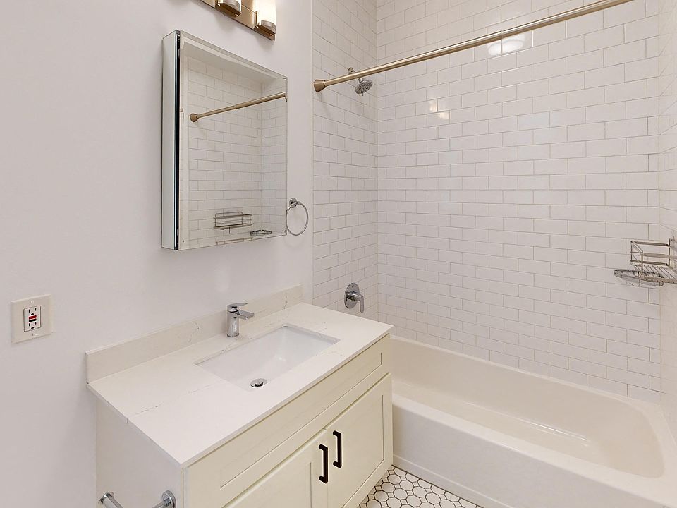 Bathroom with sink and bathtub