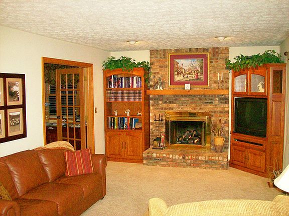 Family room,gas log frplc,French doors lead to the home office.