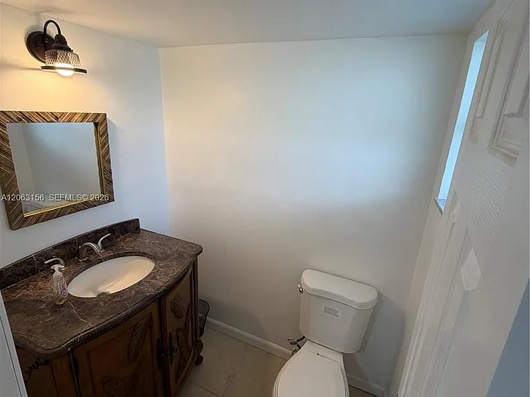 873 NE 195th St #107 — Photo 6