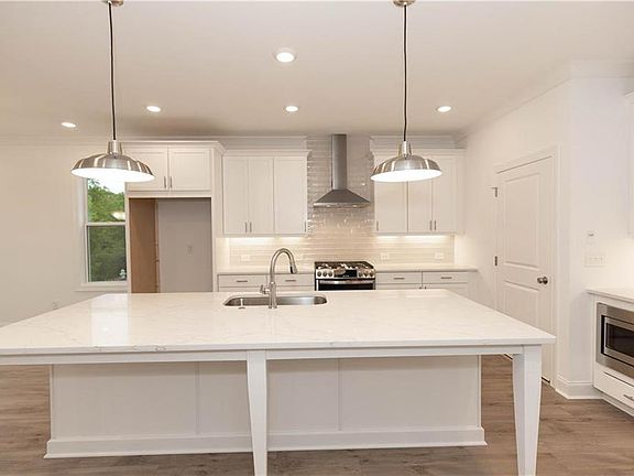 Massive island offers plenty of room for bar stools and casual dining.