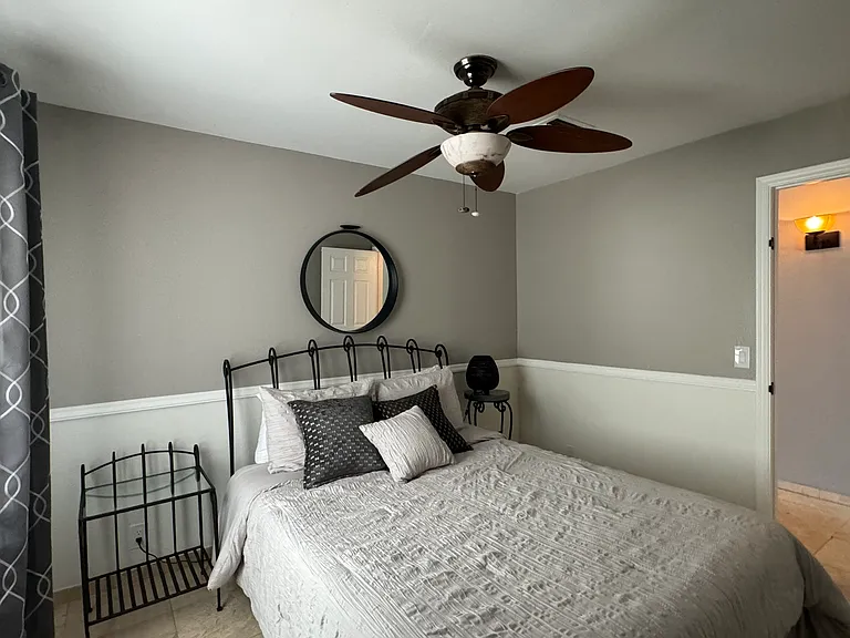 FURNISHED. 1st. Guestroom, queen size bed, walk-in closet.