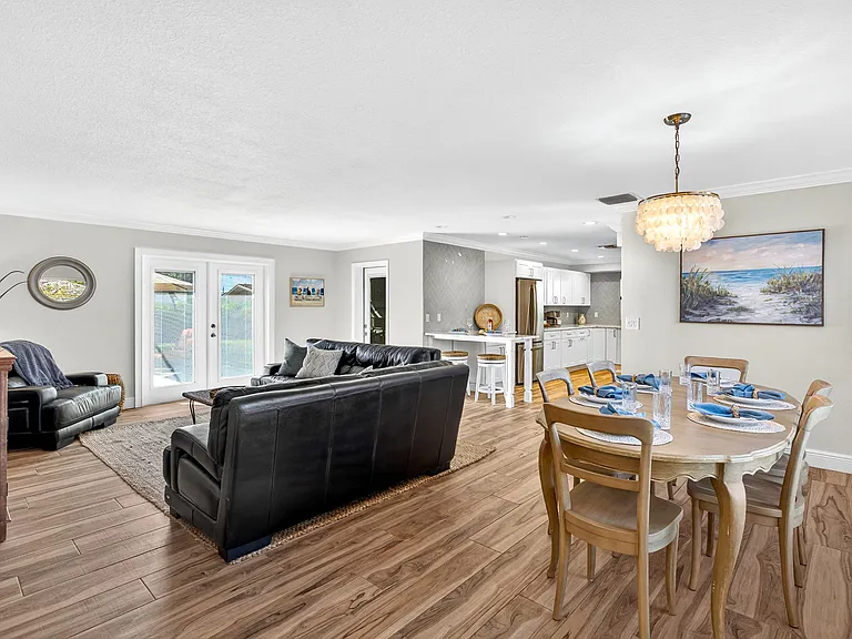 Large family room/dining room combo with easy access to the kitchen.