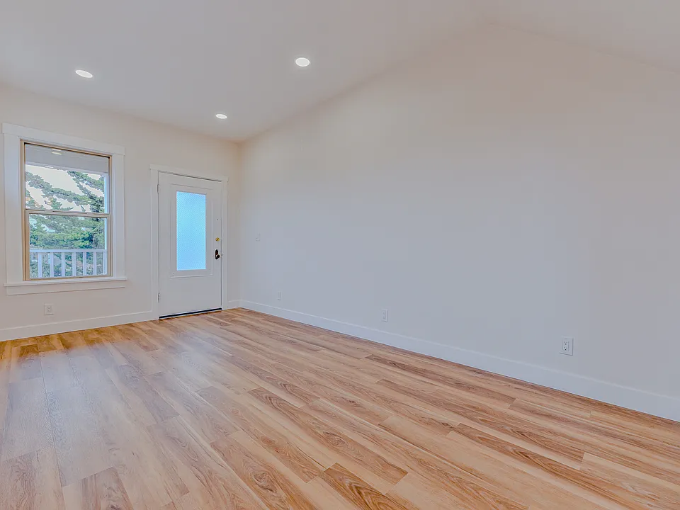Spacious Living Area with 10 Foot Ceilings and Lots of Windows