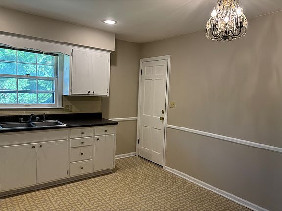 Kitchen, door to basement/garage