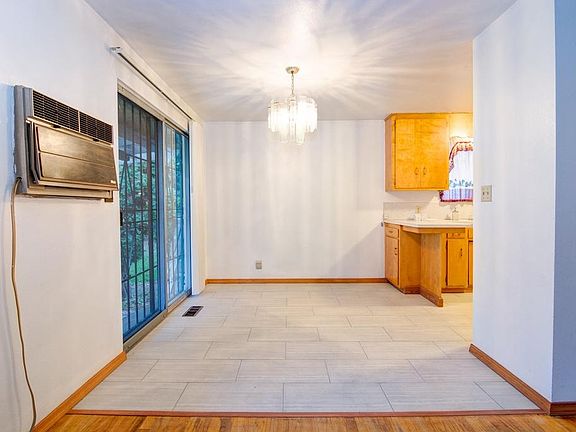 Dining room features new style tile floors