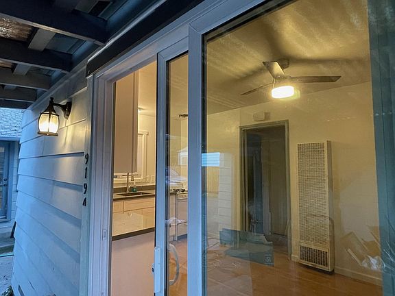 Brand new sliding glass door.