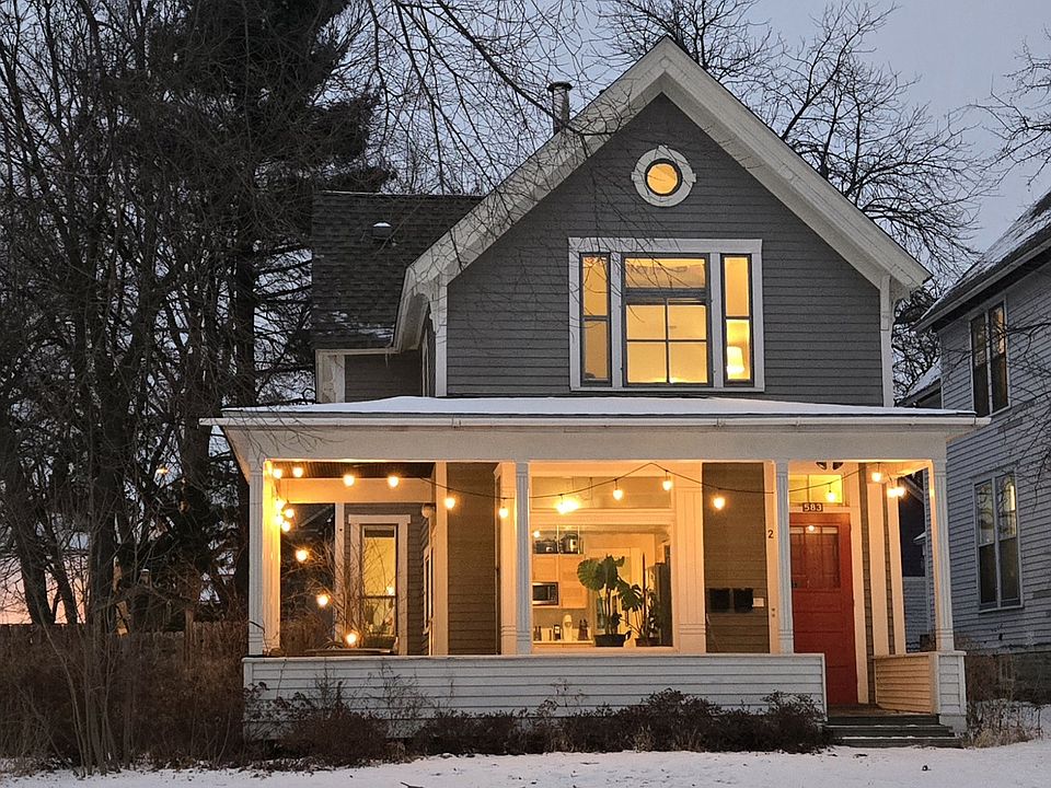 Evening view of Saint Paul Commons. Unit 1 is accessed on left side of porch.