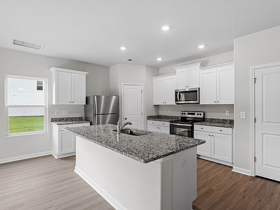 Kitchen includes stainless steel appliances