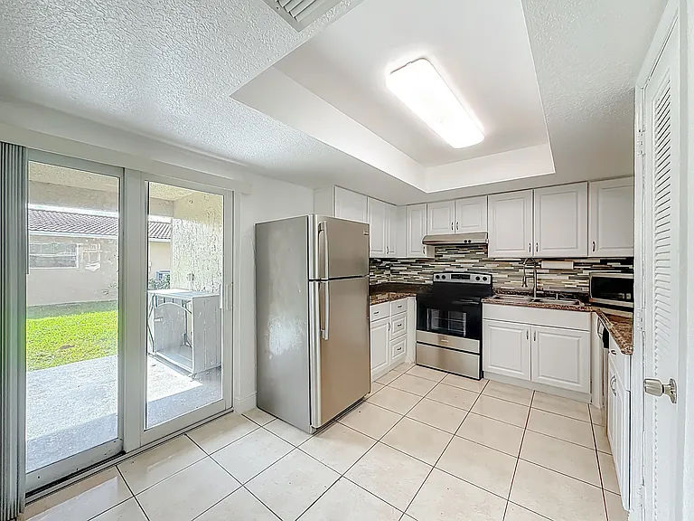 7504 NW 44th Ct #W — Photo 11