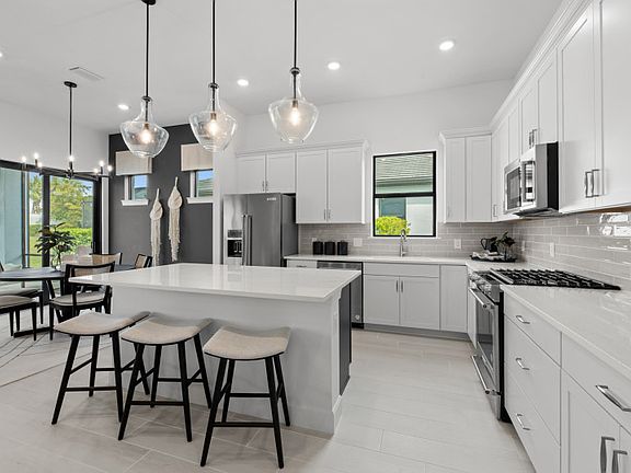 Gourmet Kitchen with modern flow through layout