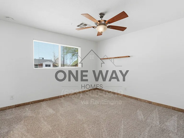 8702 E Sheridan St — Photo 13
