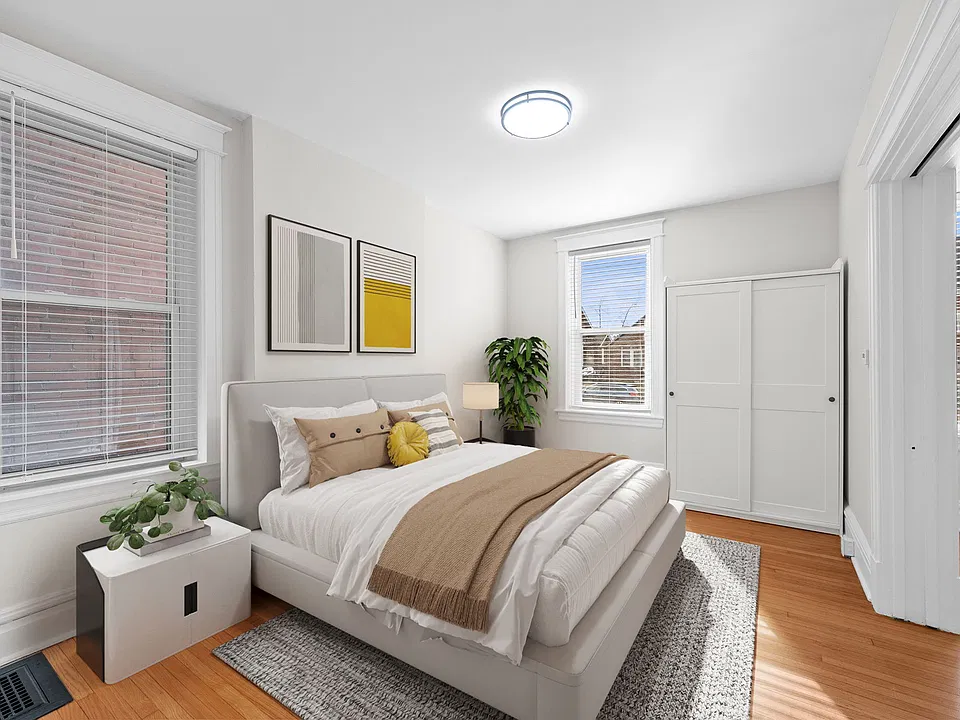 Virtually staged 2nd bedroom or dining room/ office- pocket door can be closed to living room