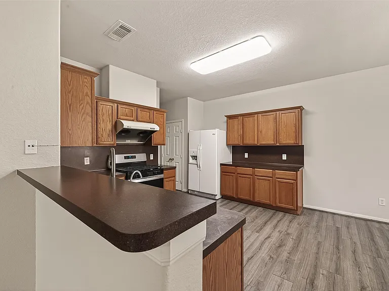 13915 Maleewan Ln — Photo 13