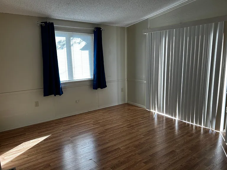 Master bedroom, sliding patio door to walk out deck
