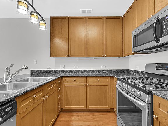4th image of 7753 Van Buren St Unit 216