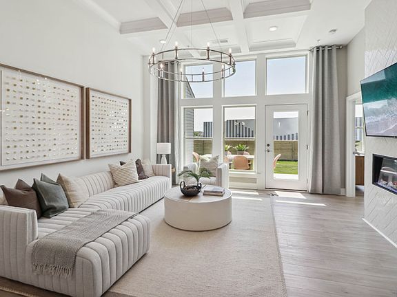 Sunlit Gathering Room Opening to the Rear Patio