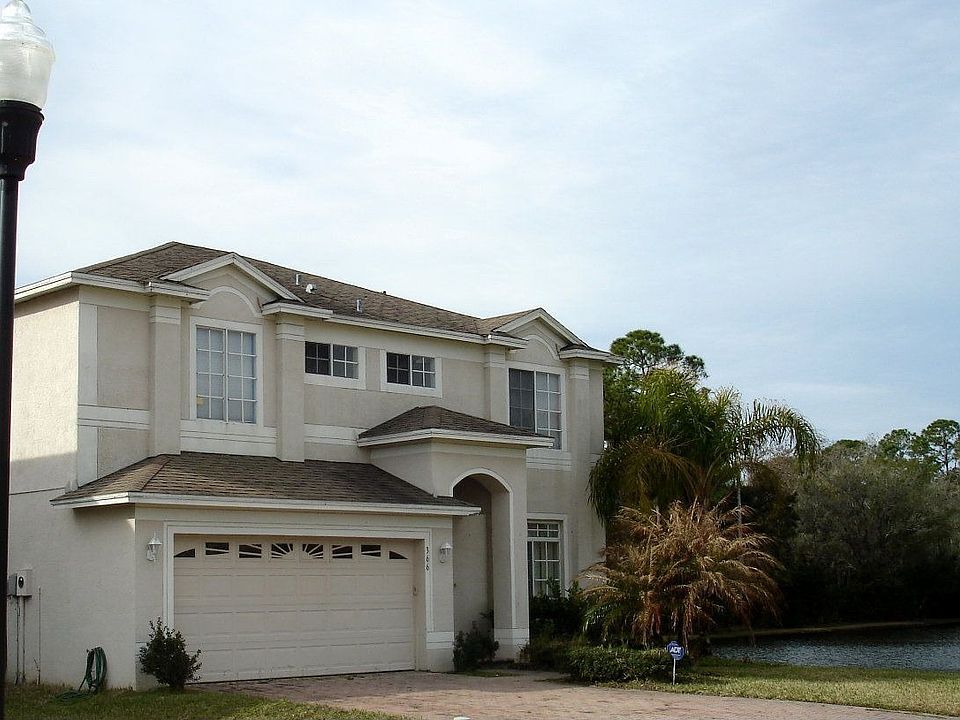 Front exterior, overlooks pond