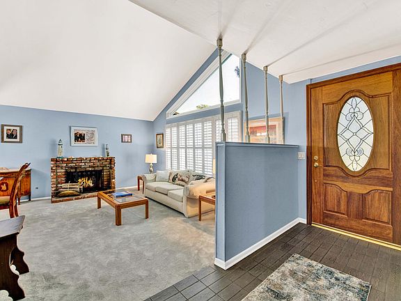 Wide entry foyer. No blue paint. Just repainted a neutral taupe