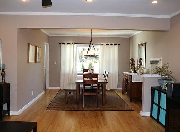 Living room flows into formal dining room making this the perfect home for entertaining.