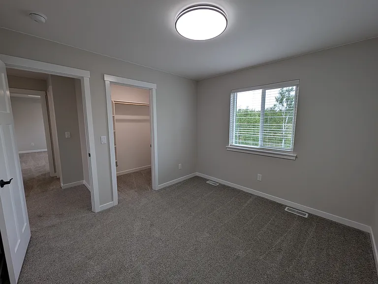 Bedroom 2, facing back of duplex.