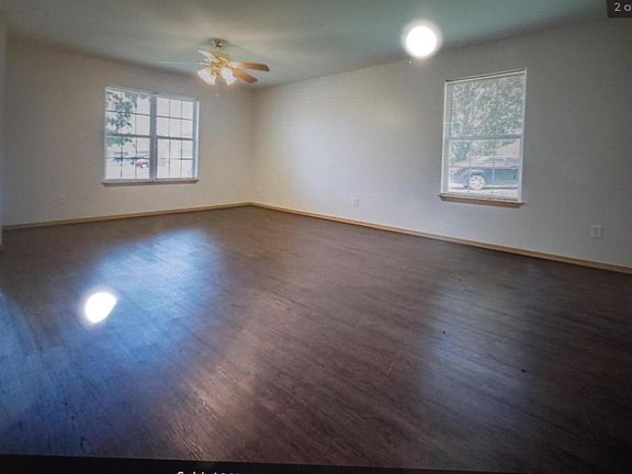 Living room adjacent to front door.