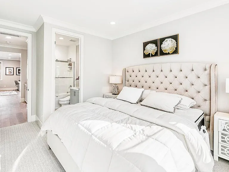 All bedrooms are en suite They all have custom closets, window treatments and crown molding.
