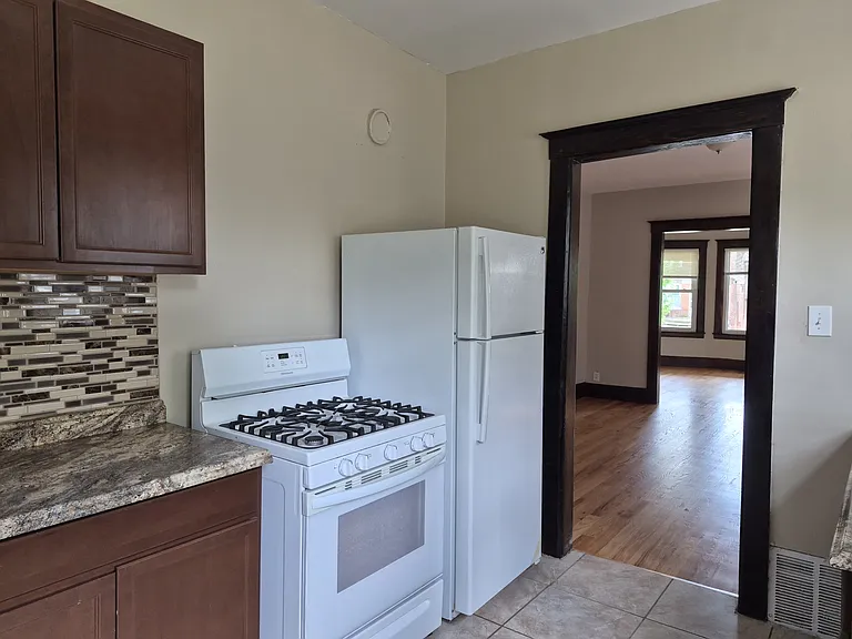 Kitchen appliances and view of the dining room and the living room from the kitchen.