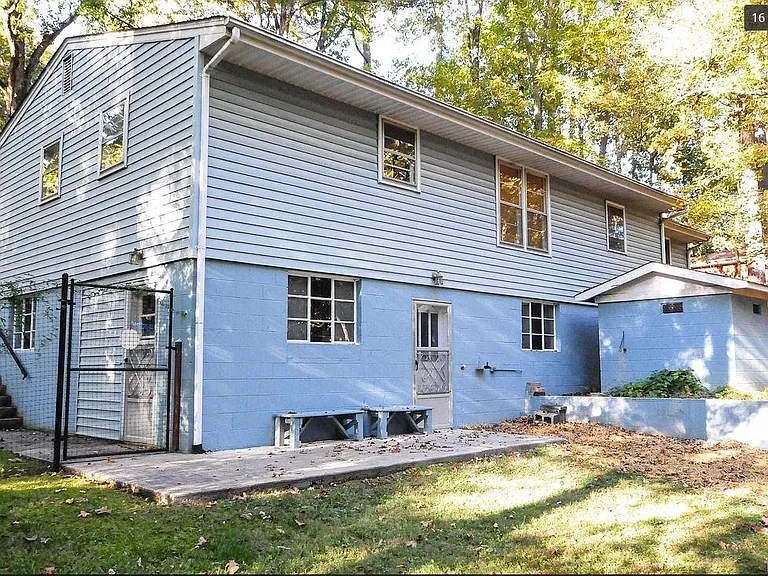 Note patio and storage shed