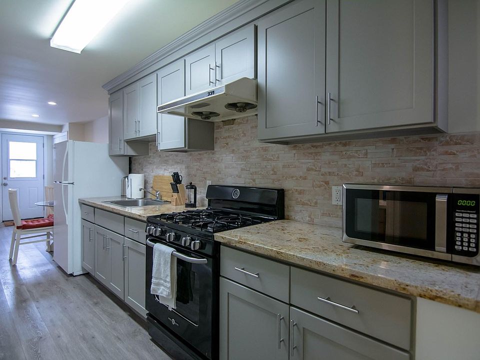 Kitchen area with brand new countertops and cabinets