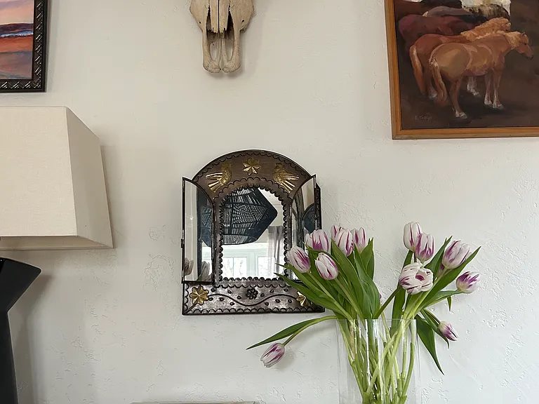 Entry table in living room, plenty of light for artwork and decor.