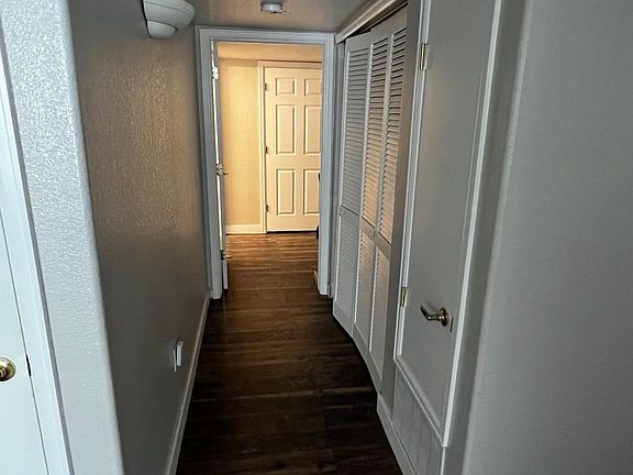 Hallway to master, laundry on right