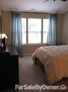 Master bedroom #1 : Full bath, triple window, vaulted ceilings, MASSIVE closet.