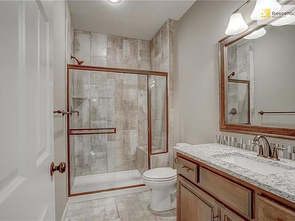 This bathroom includes: Stained vanity cabinets with granite tops, Kholer oil rubbed bronze bath fixtures, and designer pulls. Proflow 1500 Series comfort height elongated toilets.