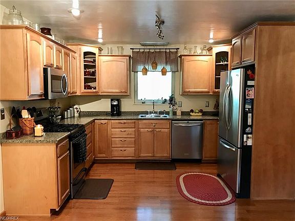 Recently remodeled kitchen ... new cabinets, counter top and sink. Just beautiful!!