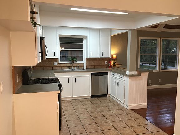 Kitchen w/bar open to living