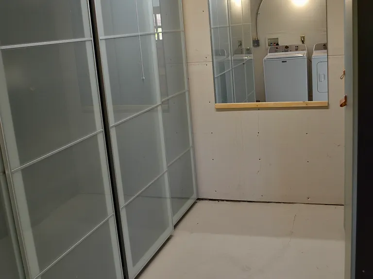 Dedicated Washer/dryer area with storage area.