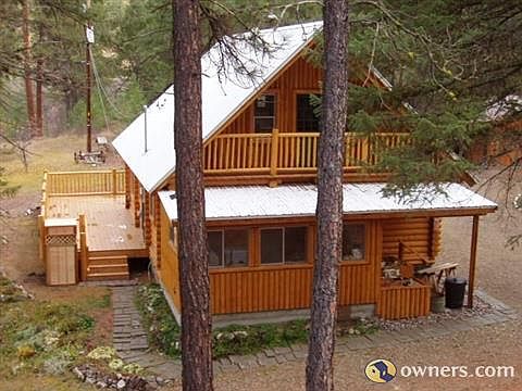 View east of the west side of the log home.
