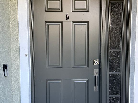 Front door with upgraded doorbell