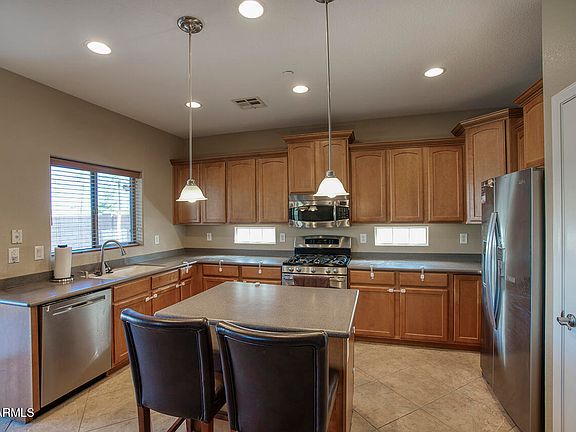 5th image of 3225 N 137TH Drive
