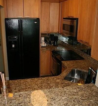 Kitchen with granite tops/maple cabinets