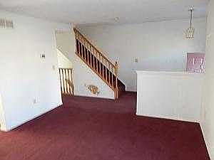 Livng Room - View 2 - Foyer and Stairway