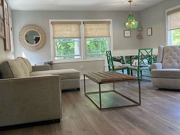 Living area above garage connected to kitchen