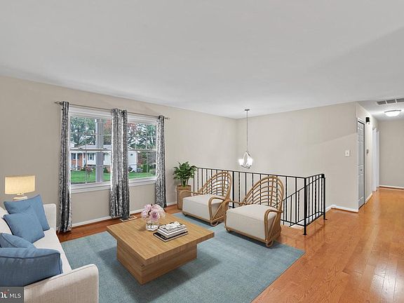 Gleaming hardwood and brand new windows