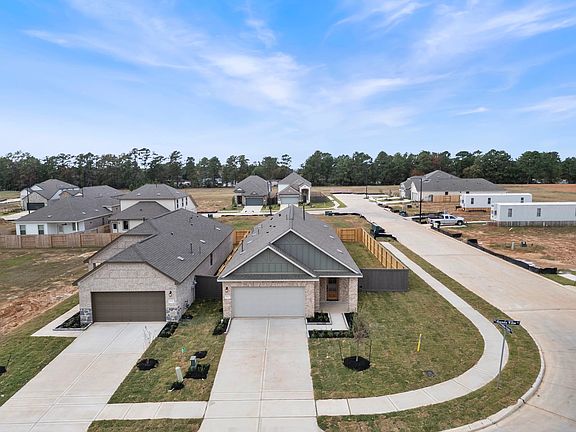 An additional view of your large corner lot, community and home.