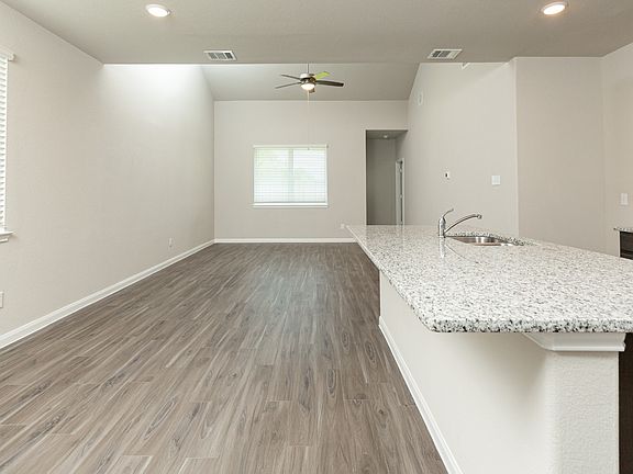 Dining Area and Kitchen to Family Room