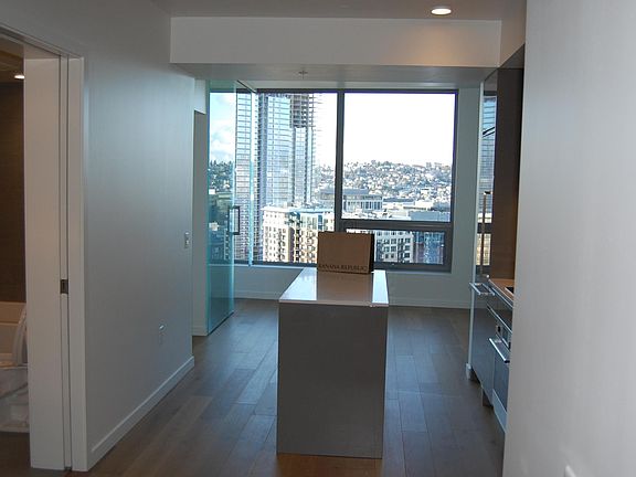 Kitchen Island for added storage, can serve as breakfast bar. Can be rotated as per your decor needs